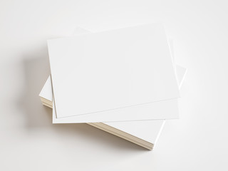 pile of blank business cards on white background