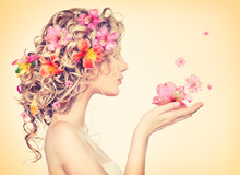 Beauty Girl Takes Beautiful Flowers In Her Hands