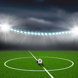 Fototapeta Sport - soccer field center and ball