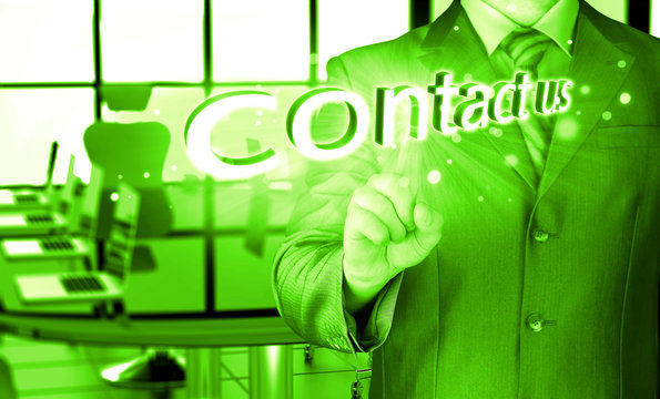 Businessman pushing CONTACT US sign