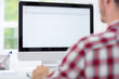 © luckybusiness - young man  using computer