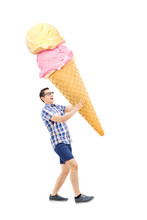Cheerful Young Man Carrying An Enormous Ice Cream