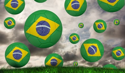 Aufkleber - Composite image of footballs in brasil flag colours