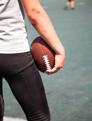 athlete with broken elbows keeps the ball