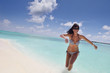 © .shock - beautiful young woman  on beach have fun and relax
