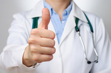 Doctor With Thumbs Up Gesture