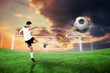© WavebreakMediaMicro - Composite image of football player in white kicking