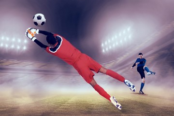 Aufkleber - Composite image of goalkeeper in red making a save