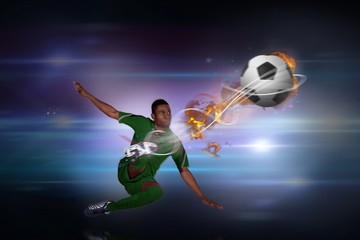 Aufkleber - Composite image of football player in green kicking