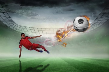 Aufkleber - Composite image of football player in red kicking