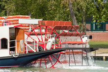 Riverboat And Paddle Wheel