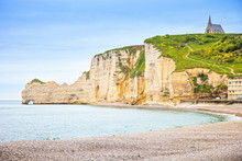 Etretat Cliff, Church Landmark And Beach On Morning. Normandy, F