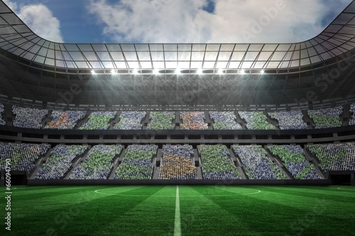 Fotografía Large football stadium under spotlights