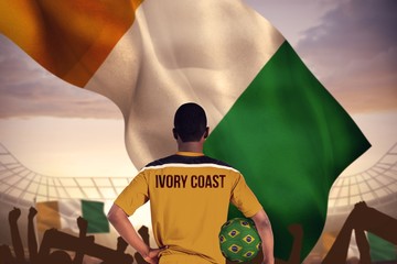 Aufkleber - Composite image of ivory coast football player holding ball