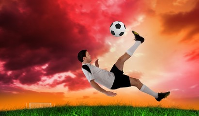 Aufkleber - Composite image of football player in white kicking
