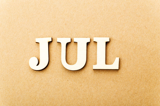 Wooden text for July