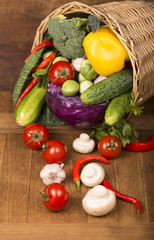 Wall Mural - Healthy Organic Vegetables on a Wooden Background