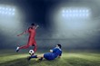 © WavebreakMediaMicro - Composite image of football players tackling for the ball