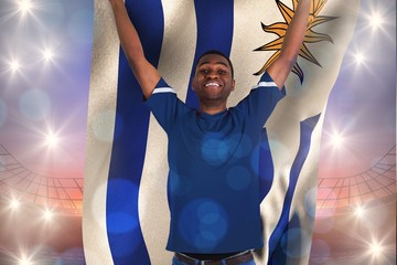 Aufkleber - Composite image of cheering football fan in blue jersey holding
