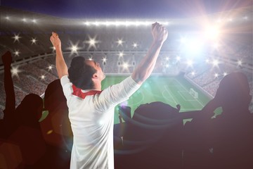 Aufkleber - Composite image of excited football fan cheering