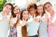 © pikselstock - Young people with thumbs up