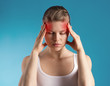 © Stasique - Stressed female having migraine shown with red spots