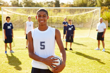 Wall Mural - portrait of player in high school soccer team