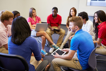 Wall Mural - high school students taking part in group discussion