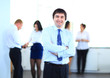 © ASDF - Smiling businessman in his office