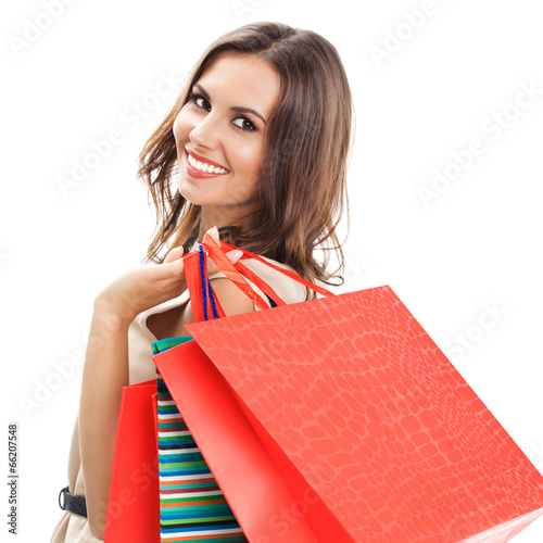 Fotografía Young happy woman with shopping bags, isolated