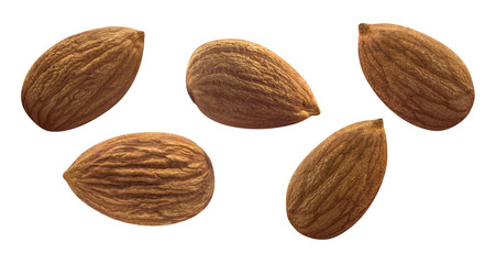 Multiple isolated almonds on white