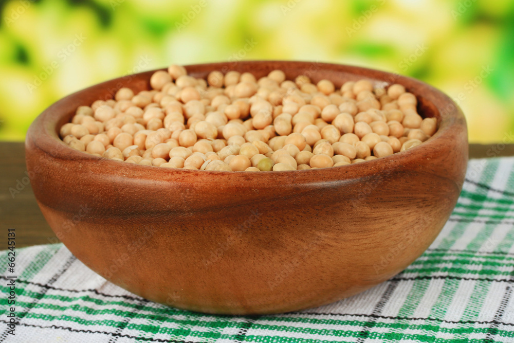 Soy beans on table on bright background