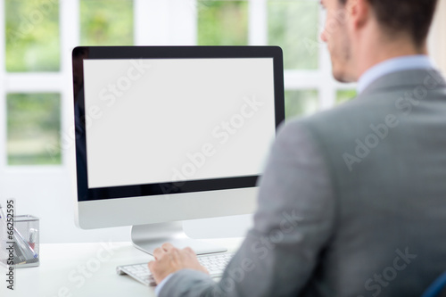 Fotografia Businessman in front of computer