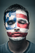 Man With USA Flag On Face And Closed Eyes