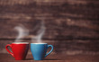Two tea or coffee cup on wooden table.