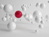 Single red ball amongst floating white balls