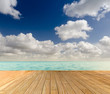 Tropical seascape with empty wooden jetty giving a warm relaxing