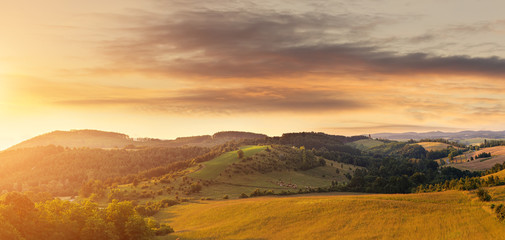 Wall Mural - Beautiful hilly field, photographed from a height