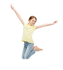 Canvas Print - smiling little girl jumping