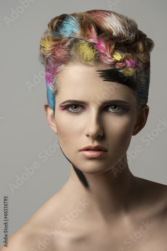 Fototapeta na wymiar cute girl in multicolor beauty shoot