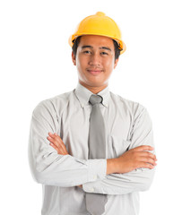 Wall Mural - Asian male wearing yellow hardhat.