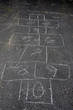© driftwood - hopscotch game on asphalt