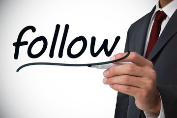 Poster - Businessman writing the word follow