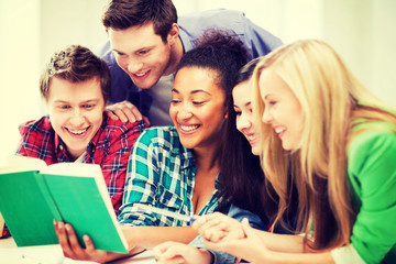 Canvas Print - students reading book at school