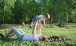 © guas - Father and son rest in the park, having fun, family, happiness