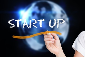 Poster - Businesswoman writing the word start up