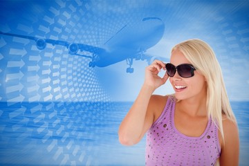 Poster - Composite image of blond woman with sunglasses