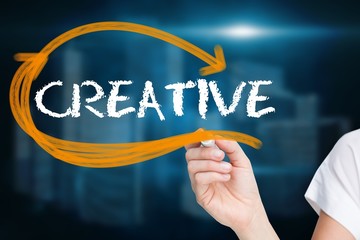 Poster - Businesswoman writing the word creative