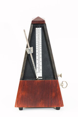 musical metronome on a white background