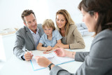 Fototapeta Panele - Family meeting real-estate agent to buy new home